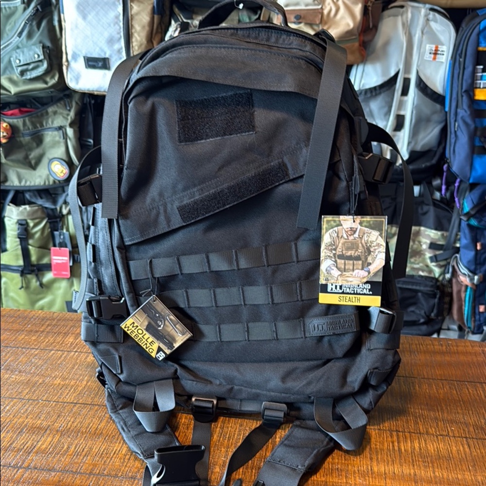 Black Tactical Backpack with MOLLE Webbing and Hydration Compatibility